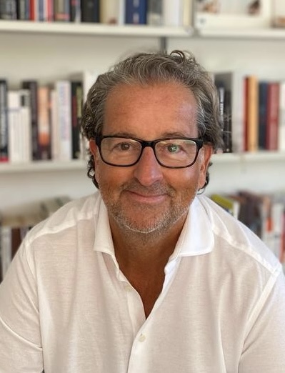 Colour photo of Andreas Unruh, Dishang UK's Business Development Director for Central Europe (DACH Region), wearing glasses and a white shirt